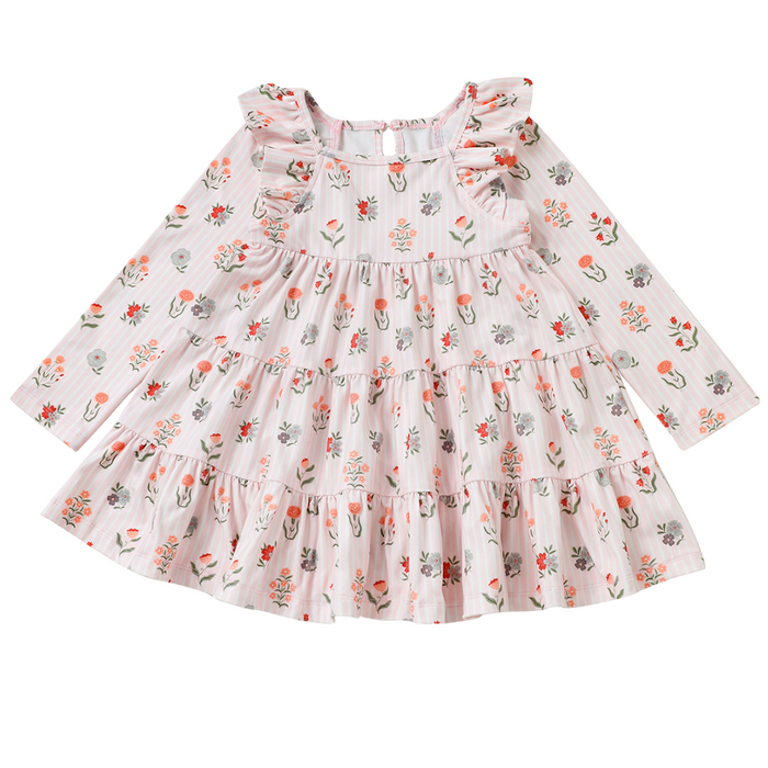 Girls pink floral tiered dress with ruffle shoulders and long sleeves on a white background.