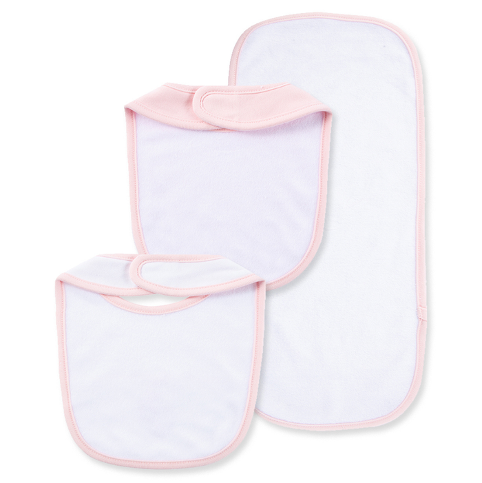 Back view of two baby bibs and matching burp cloth showing soft white absorbent backing with pink trim and hook-and-loop closures.