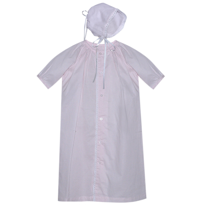 Baby pink heirloom daygown with lace trim, button front detail, and matching bonnet on white background.