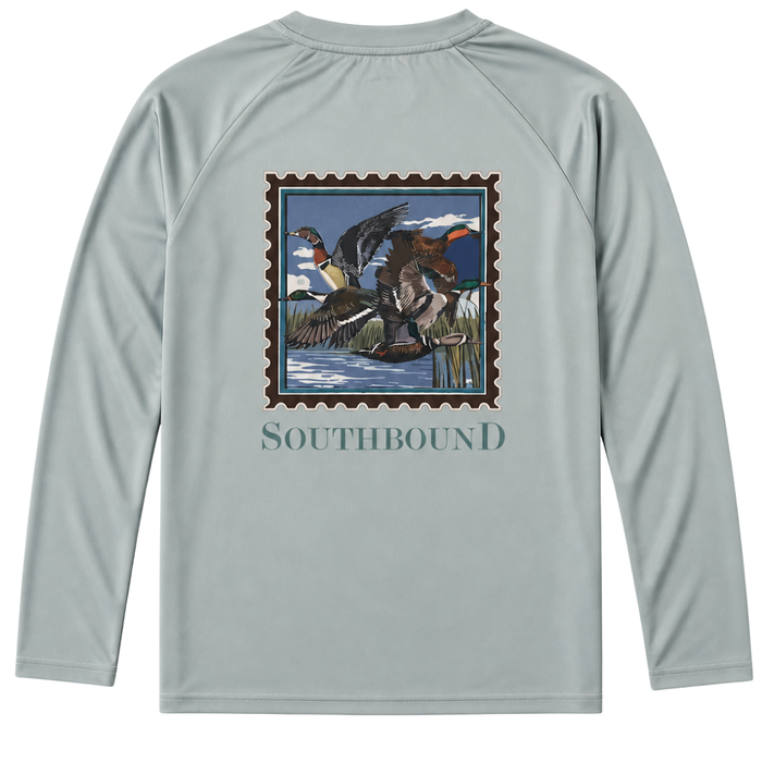 Boys light blue long sleeve performance shirt with duck hunting stamp graphic and “Southbound” text on the back