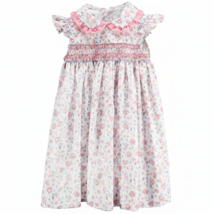 Girls Bunny Tales smocked dress with pink hand-smocked neckline, flutter sleeves, and pastel bunny print on white fabric
