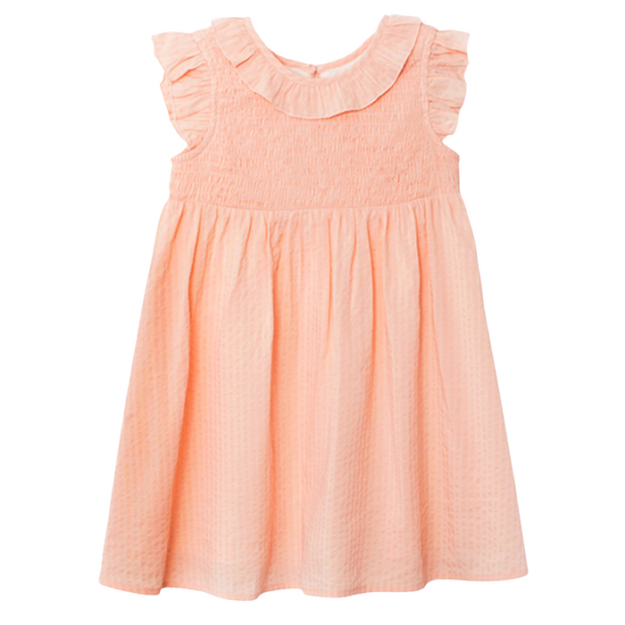 Peach smocked girls dress with ruffle collar and flutter sleeves on white background