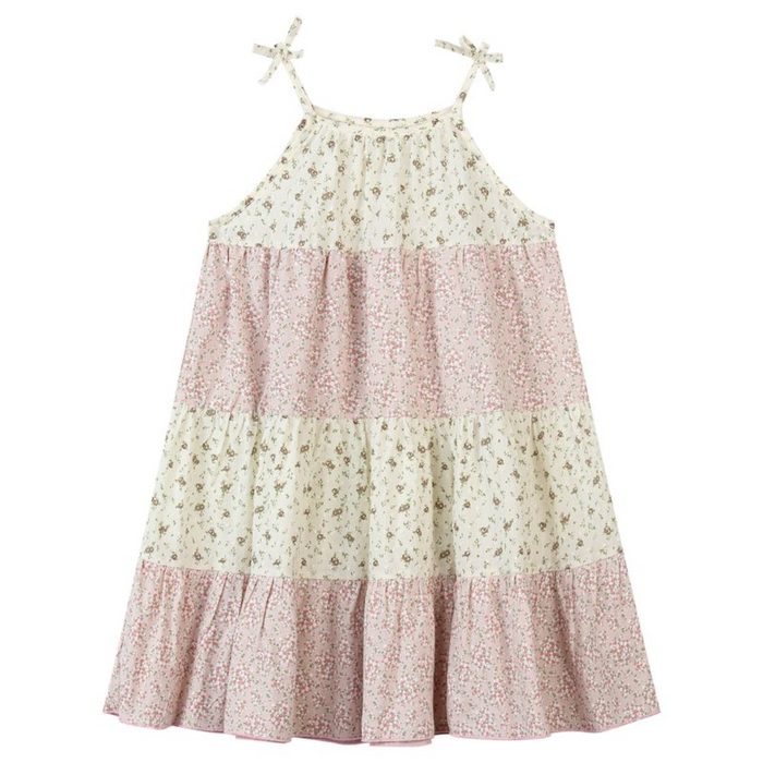 Girls Kit dress with pink mixed floral print, tiered skirt, and adjustable tie shoulder straps
