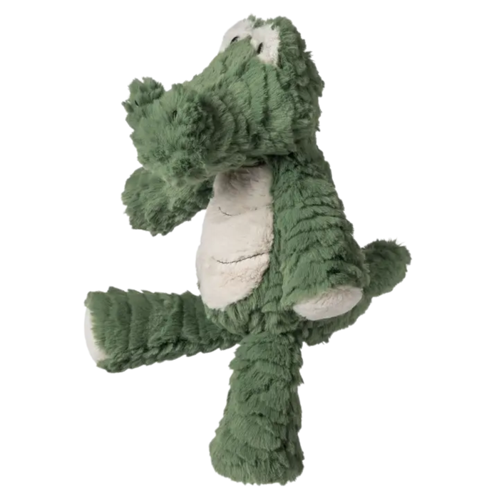 Green plush alligator stuffed animal with marshmallow-soft textured fabric, cream belly, floppy limbs, and a gentle embroidered face