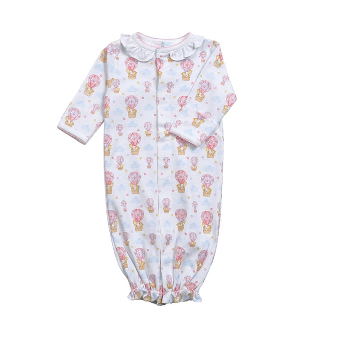 white gown with a ruffle collar and pink hot air balloon print.