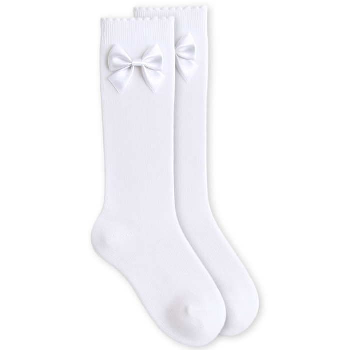 White ribbed knee-high girls socks with satin bow detail on the side.