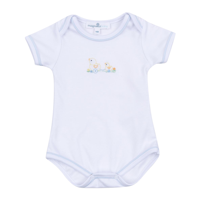 White Magnolia Baby short sleeve bodysuit with embroidered pastel duck design and snap closure at the bottom.