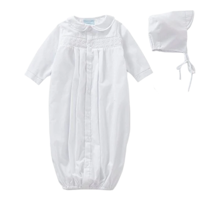 White smocked gown with a bonnet.