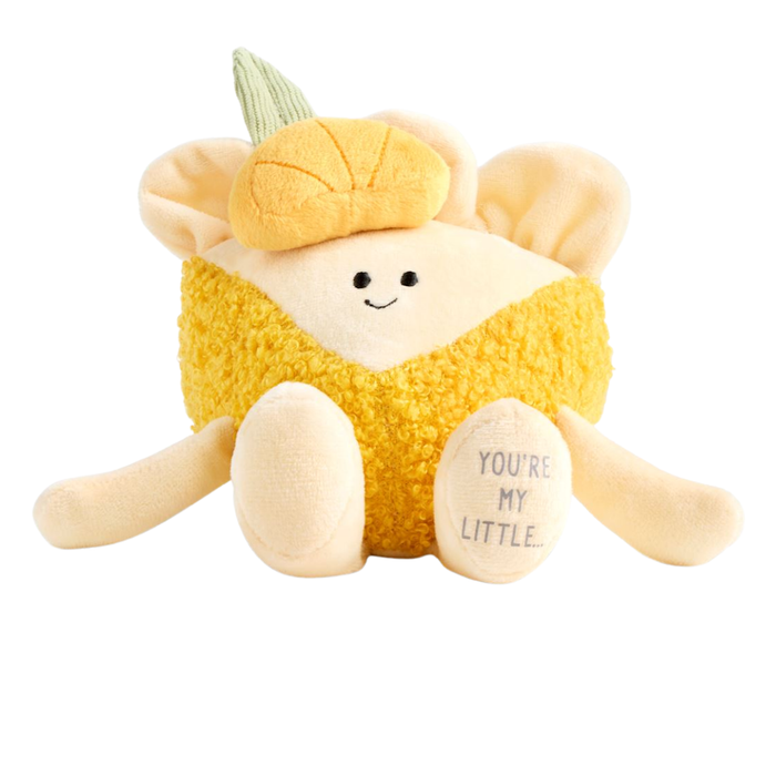 Cute pie-themed plush toy with orange textured filling, citrus slice top, embroidered face, and “You’re My Little…” foot message on a white background.