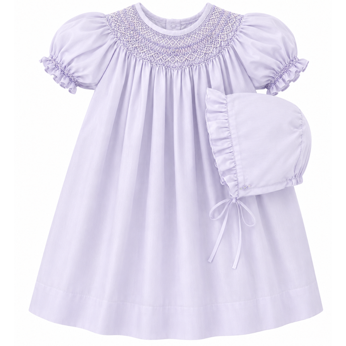 Smocked Lavender baby dress with matching bonnet on a white background