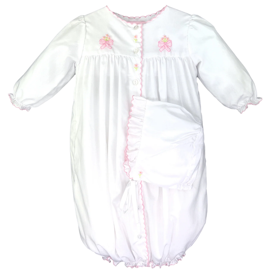Baby girl white convertible gown with pink trim, embroidered bow details, and matching bonnet