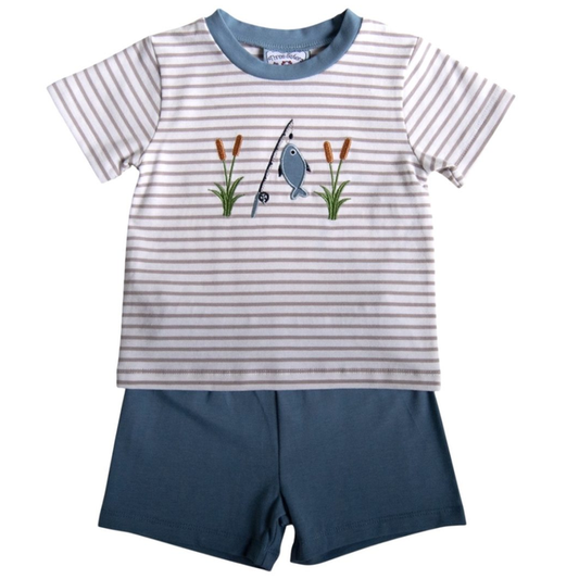 Boys striped short sleeve shirt with fishing rod and fish appliqué paired with solid blue shorts on a white background.
