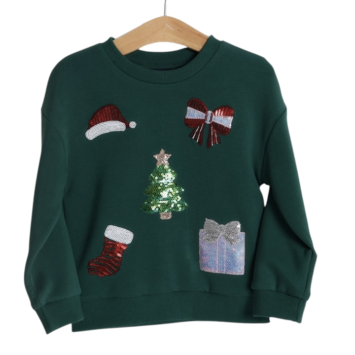 Girls green sweatshirt with sequin Christmas tree, bow, Santa hat, stocking, and gift designs on hanger