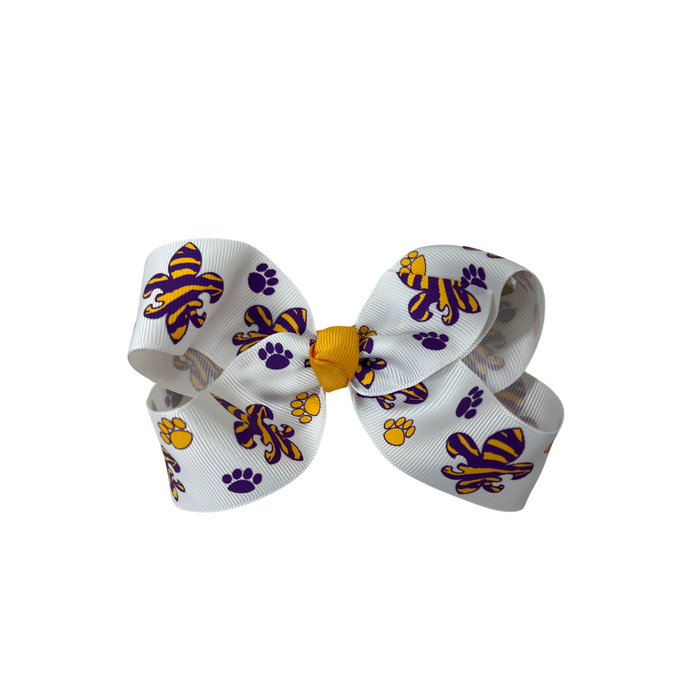 white bow with yellow and purple tiger stripped fleur de lis and yellow and purple paw prints.