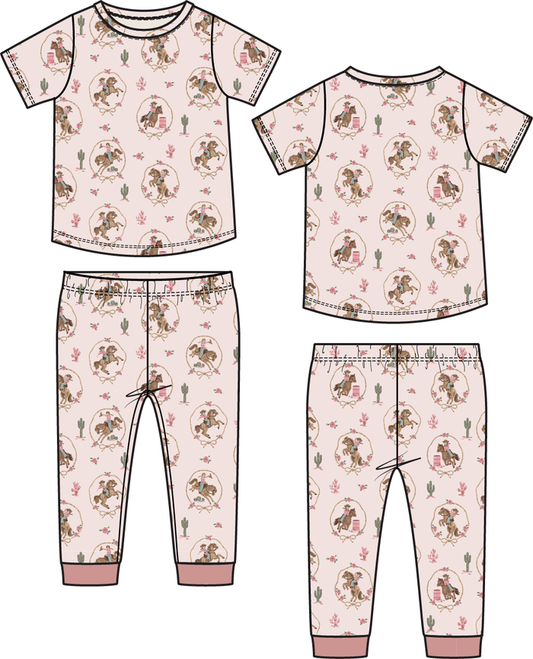 Girls cowgirl print loungewear set with short sleeve top and matching pants in soft pink western pattern