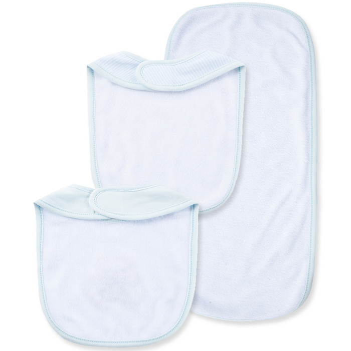 Back view of two baby bibs and matching burp cloth showing soft white absorbent backing, baby blue trim, and secure hook-and-loop closures.