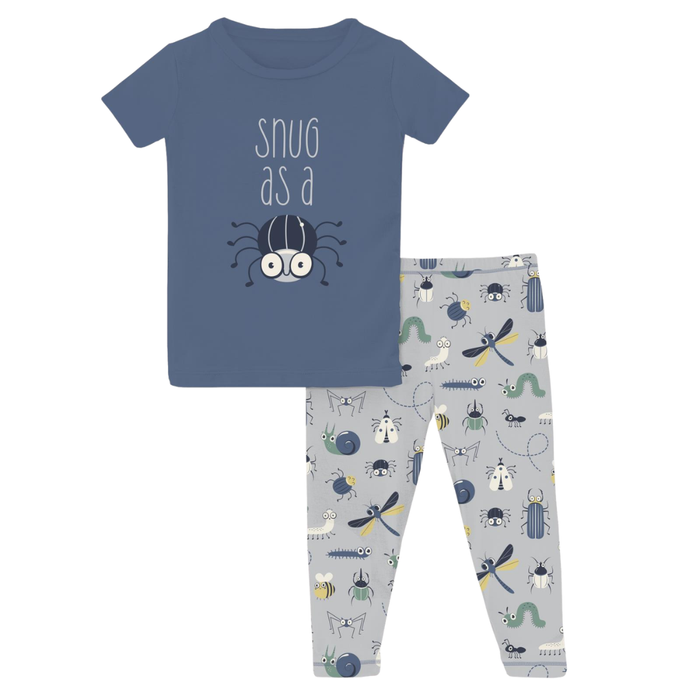 Blue boys pajama set with spider graphic shirt and gray bug print pants.