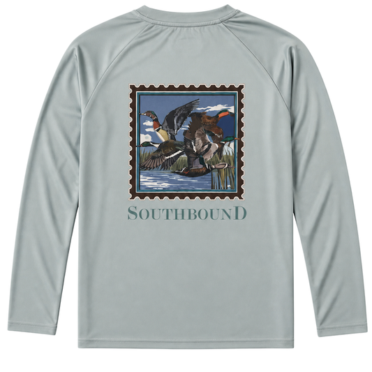 Boys light blue long sleeve performance shirt with duck hunting stamp graphic and “Southbound” text on the back