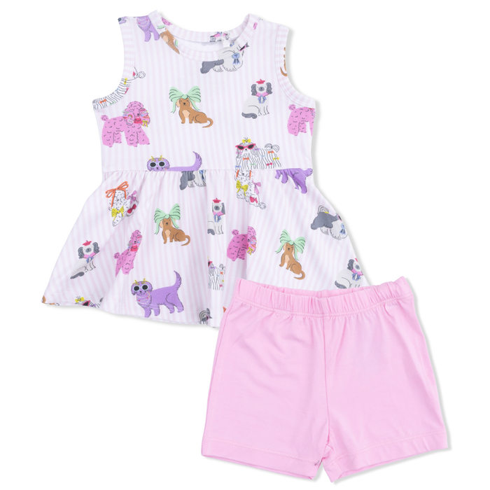 Children's outfit with sleeveless top and pink shorts featuring cartoon dog patterns on a white background.