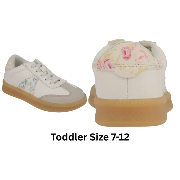 Pair of white sneakers with floral patterns on a white background and no tie elastic laces