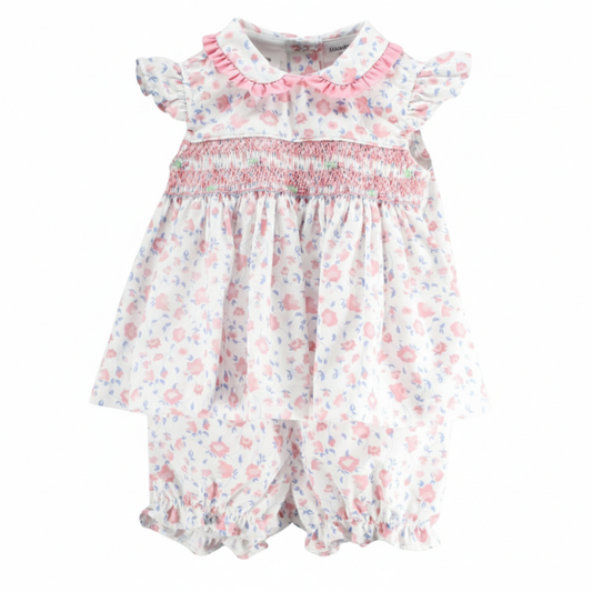 Girls Garden Song smocked dress set with pastel floral print, ruffled Peter Pan collar, flutter sleeves, and matching bloomers