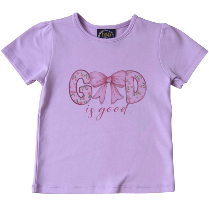 Lavender girls short sleeve tee with “God is Good” text featuring floral letters and a pink bow.
