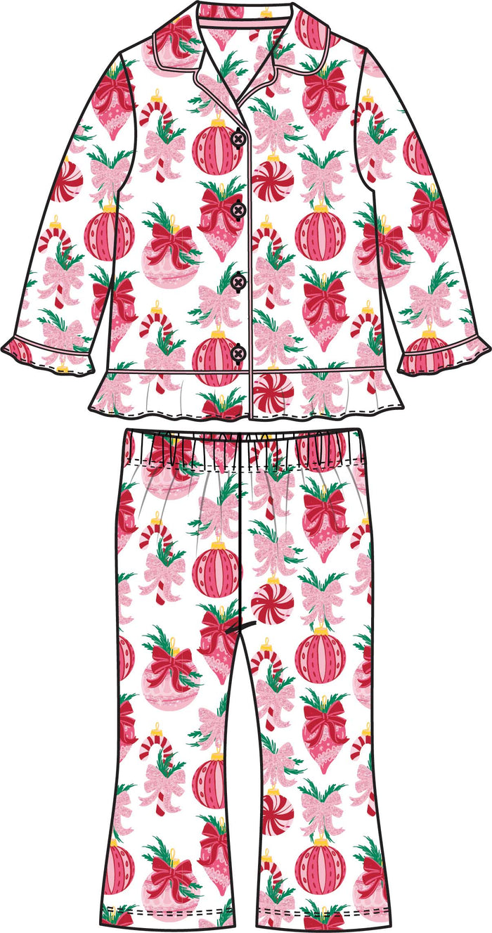 Girls two-piece Christmas pajama set with pink ornament, bow, and candy cane print, featuring a button-up top and matching pants.