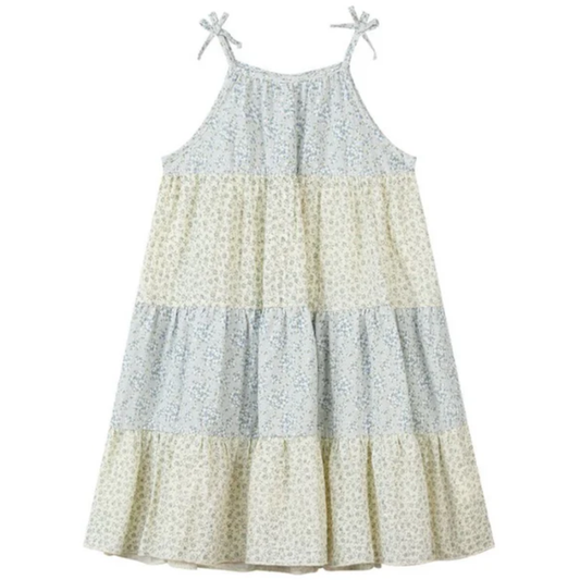 Girls tiered dress with blue mixed floral print, tiered skirt, and adjustable tie shoulder straps