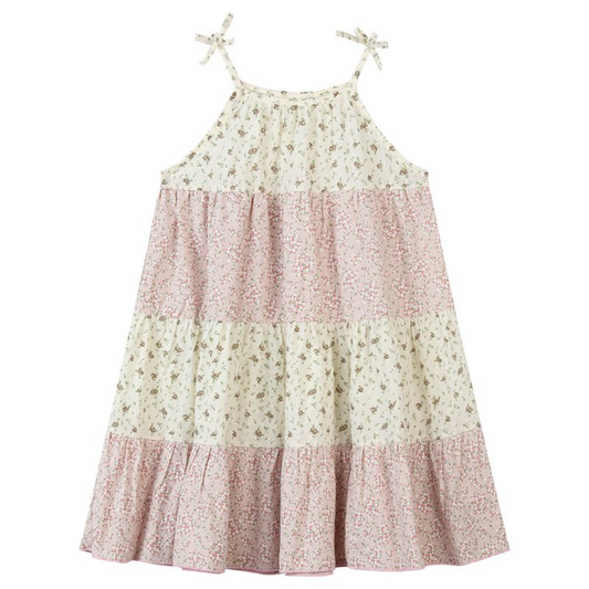 Girls Kit dress with pink mixed floral print, tiered skirt, and adjustable tie shoulder straps