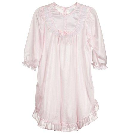 light pink gown with lace neckline and a little pink bow.