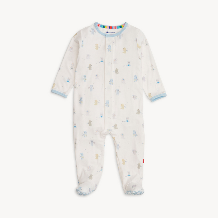 Baby wearing a soft TENCEL™ modal footie sleeper with magnetic closures and fold-over mittens for cozy, all-day comfort.