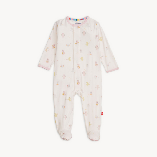 Baby wearing a soft TENCEL™ modal footie sleeper with magnetic closures and fold-over mittens for cozy, all-day comfort.