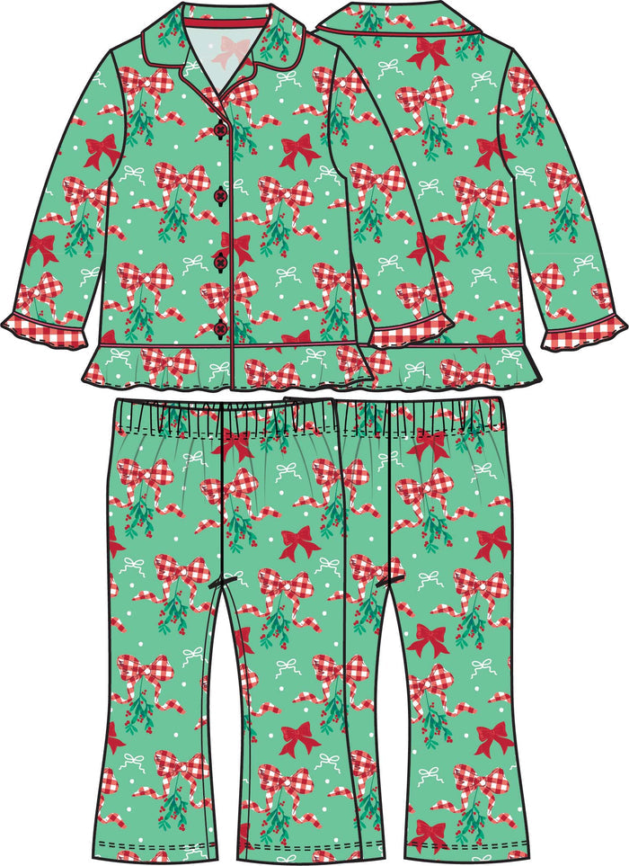 Girls green Christmas pajama set with red bows, gingham ribbon, and mistletoe print, featuring a button-up top and matching pants.