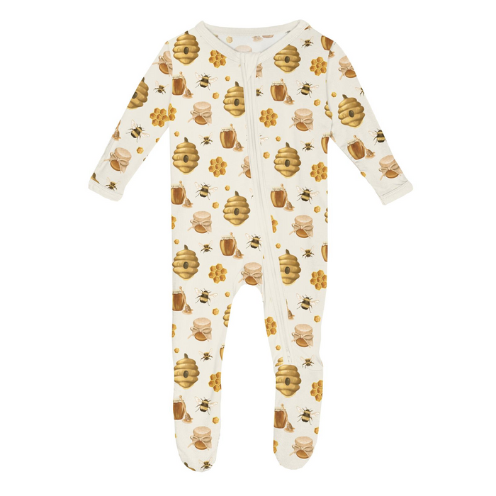 Baby bamboo zipper footie with honey bee, hive, honeycomb, and honey jar print featuring a footed design and full-length zipper.