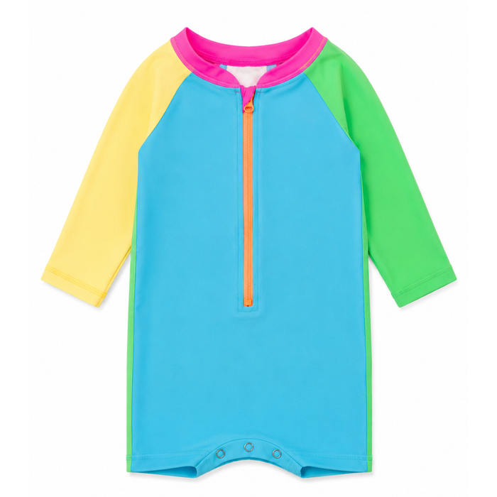 long-sleeved one-piece rash guard with color block design in neon green, blue, and yellow, featuring a front zipper.