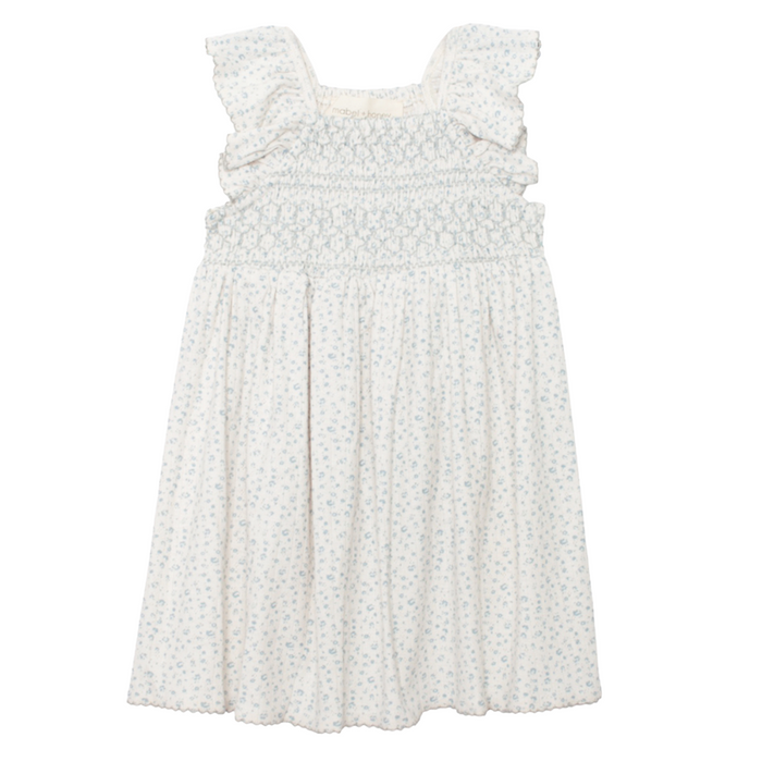 Girls blue floral smocked dress with flutter sleeves on white background