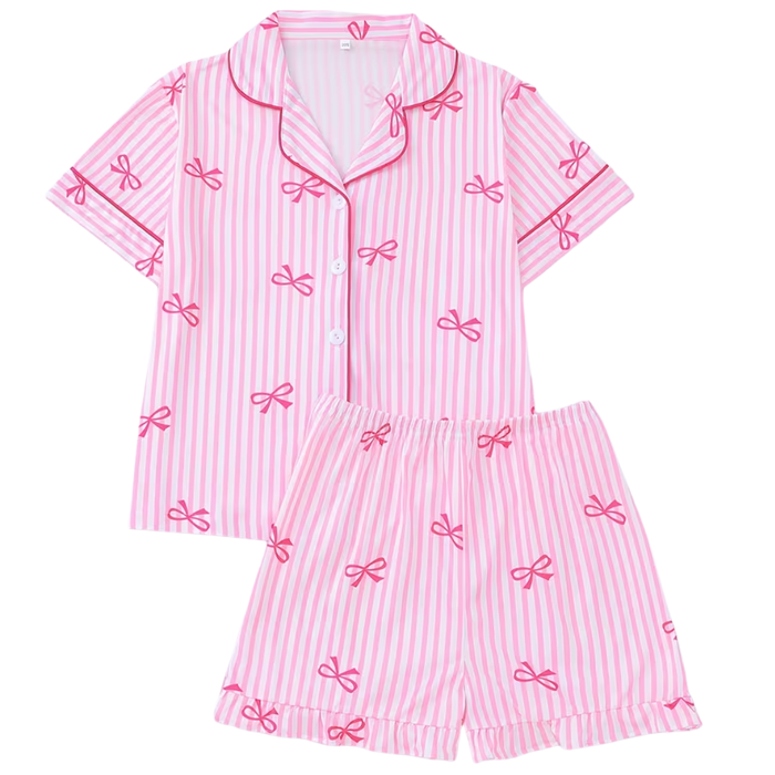 Pink striped girls pajama set with bow print featuring short sleeve button-front top and matching elastic waist shorts.