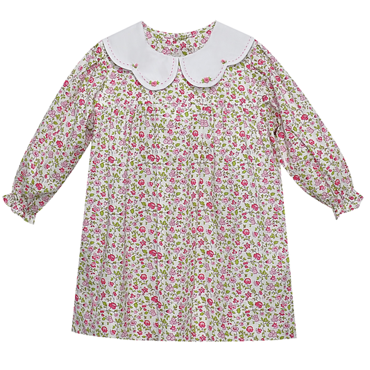 Girls’ long-sleeve dress with a pink and green floral print, ruffle cuffs, and an oversized white scalloped collar with floral embroidery.