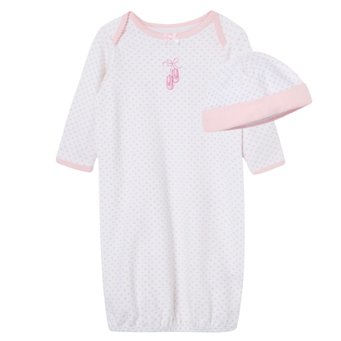 white and pink gown with ballerina slippers stitched on the front and a matching hat.