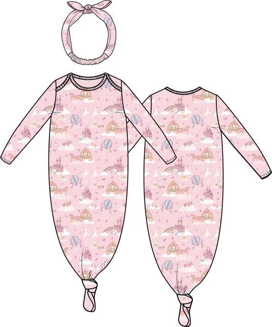 Pink baby knotted gown with unicorn, castle, and rainbow print, matching headband included, soft newborn outfit