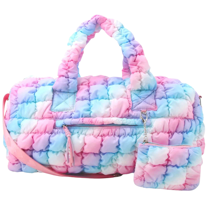 Pastel tie-dye puffer duffle bag with scrunch handles and matching zip pouch attached