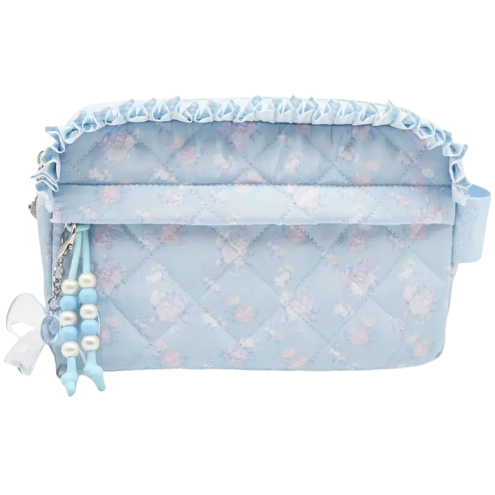 Light blue quilted floral pouch with ruffle trim and decorative zipper charm with beads and bow