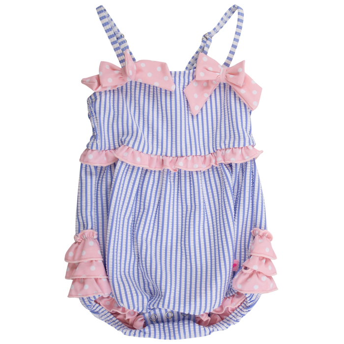 Blue and white seersucker baby girl bubble swimsuit with pink polka dot bows and ruffle accents.
