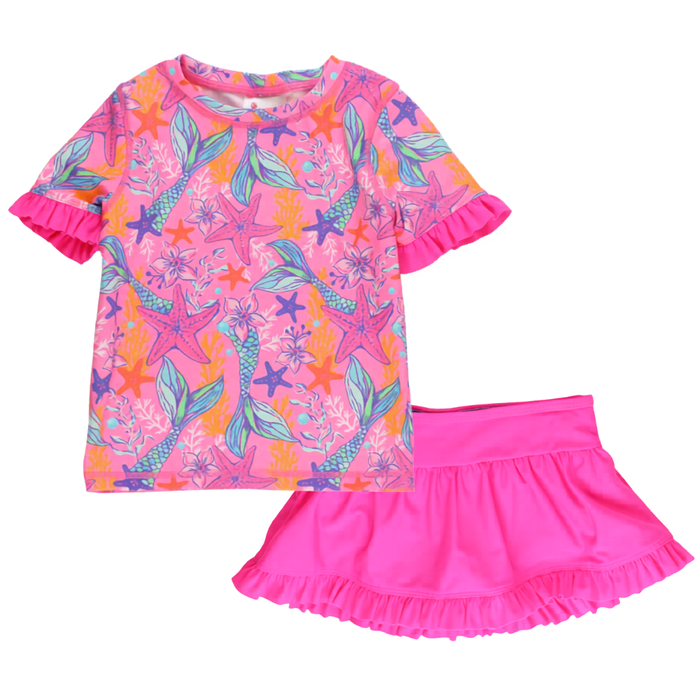 Neon pink mermaid print girls’ rashguard with ruffle sleeves paired with a matching pink ruffle swim skirt.