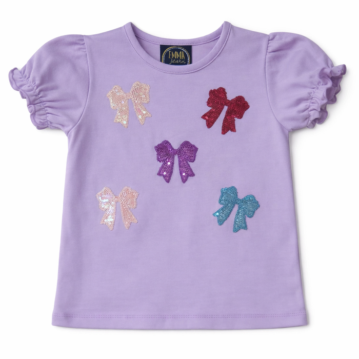 Purple t-shirt with colorful sequin bows on a white background