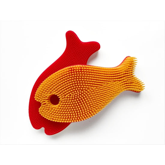 red and orange fish brush
