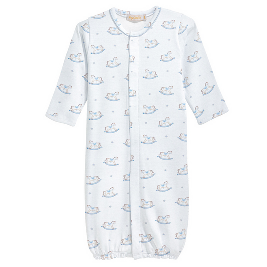 Blue baby converter gown with long sleeves and an allover print of white and blue rocking horses, featuring front snaps and an elastic bottom hem.