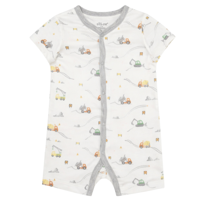 Baby short sleeve construction print romper with gray trim, featuring dump trucks, excavators, and cement mixers on white fabric.