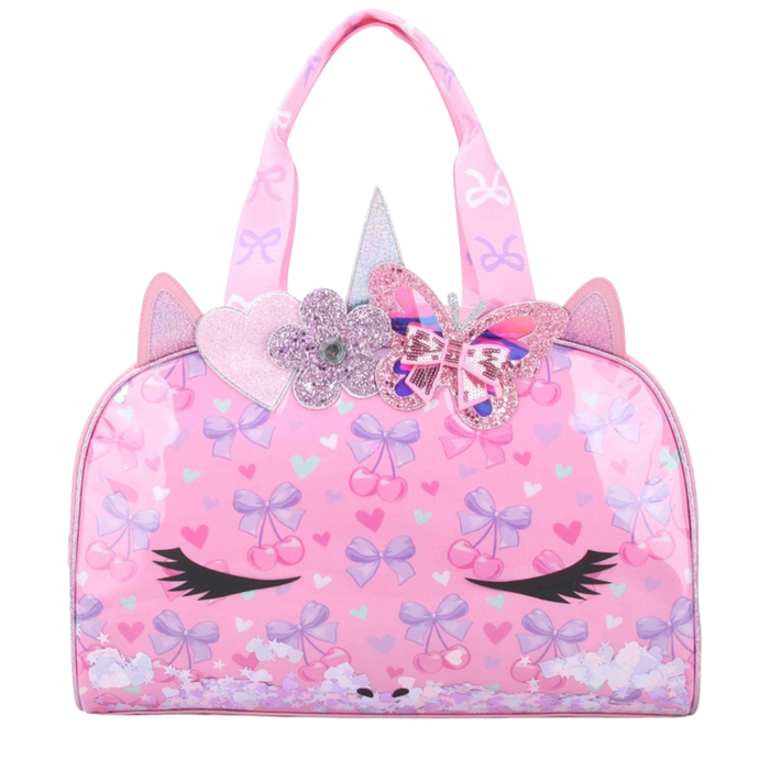 Pink unicorn duffle bag with bow and cherry print, glitter accents, and confetti bottom detail