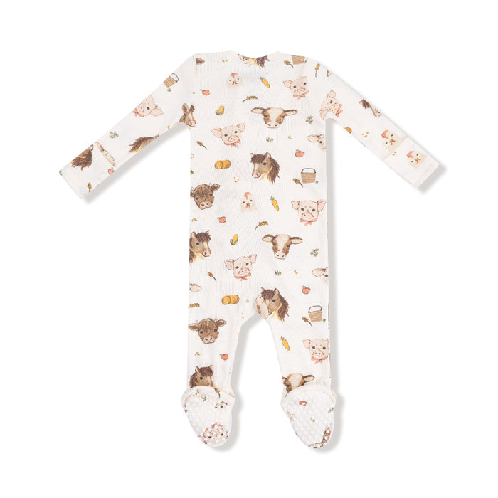 Back view of baby footie with allover print of watercolor farm animals including pigs, cows, horses, and chicks